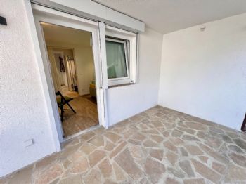 zur überdachten Terrasse